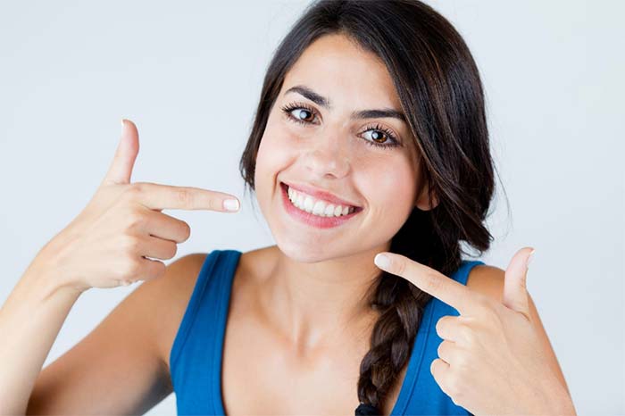 A Woman Smiling After Having Proper Dental Treatment in Boise, ID