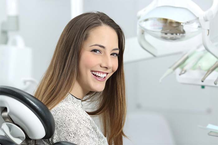 Girl at the dental clinic smiling
